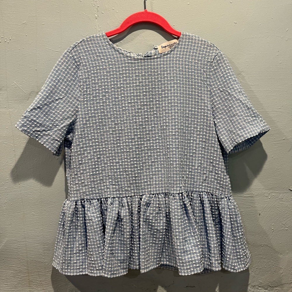 Never worn seer sucker tie back peplum